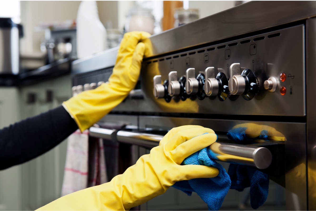 A freshly cleaned, gleaming kitchen stovetop